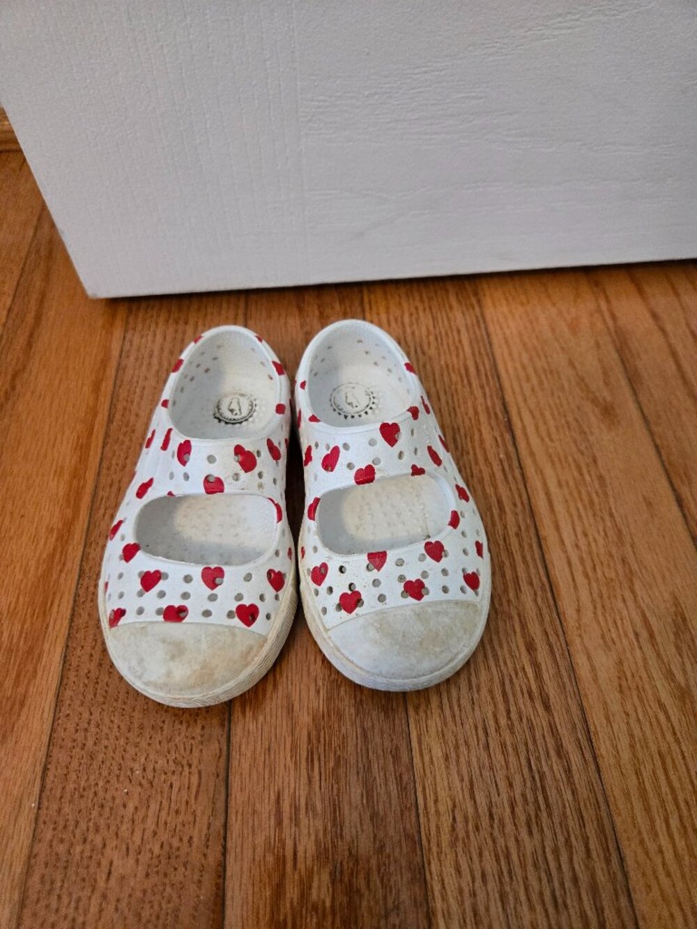 Baby girls size 5 white and red heart Native shoes